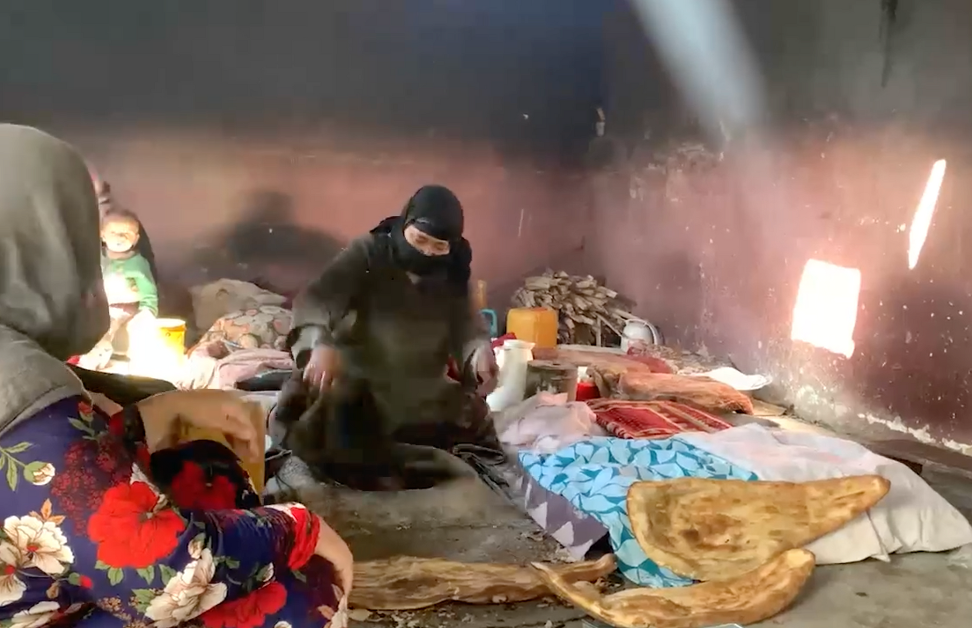 Baking Bread to Feed Her Children