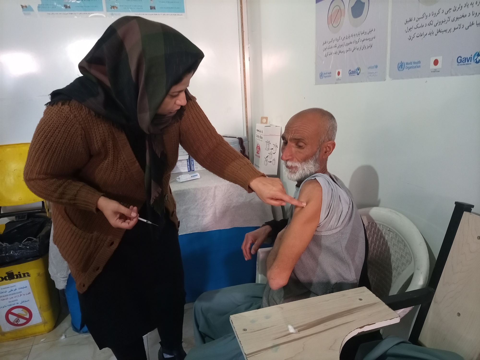 Will Vaccines Work, Is the Virus Real; Afghans Wonder